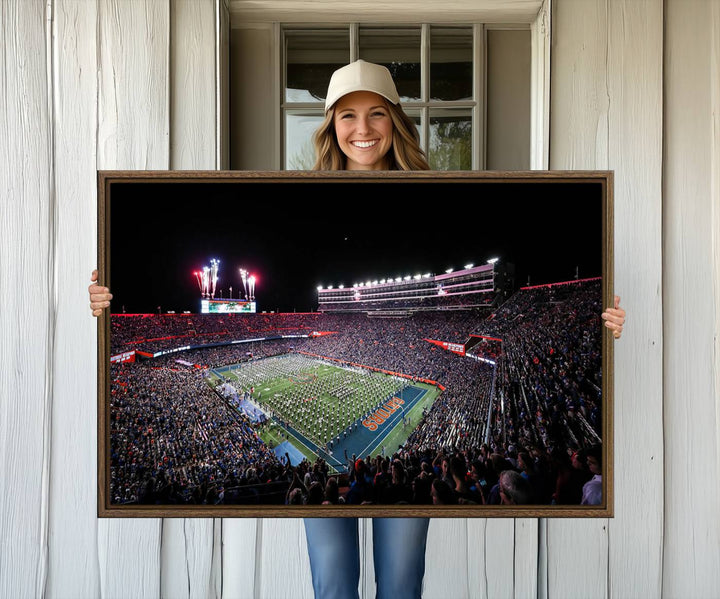 The Gators Night Game Canvas Art captures a lively night at Ben Hill Griffin Stadium with vibrant fireworks and the energy of a live band.