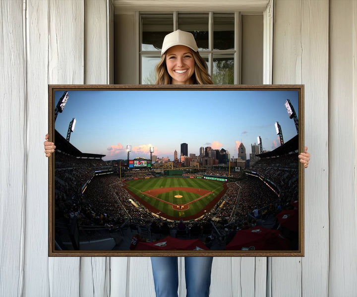 The PNC Park Evening Game Canvas, featuring a skyline backdrop, is displayed on the wall.