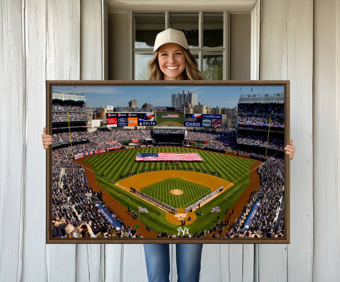 The Yankee Stadium New York wall art print features a vibrant scene of baseball fans with a large flag and players, expertly capturing the spirit of the game. This ready-to-hang décor is perfect for adding a dynamic touch to any space.