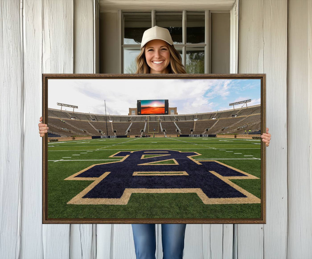 Notre Dame Stadium Triptych: This ready-to-hang giclee canvas print features a vibrant depiction of the football field adorned with an A logo and a stunning sunset.