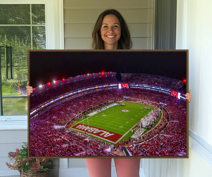 The living room features a Bryant-Denny Stadium Night Game Triple Canvas Wall Art.