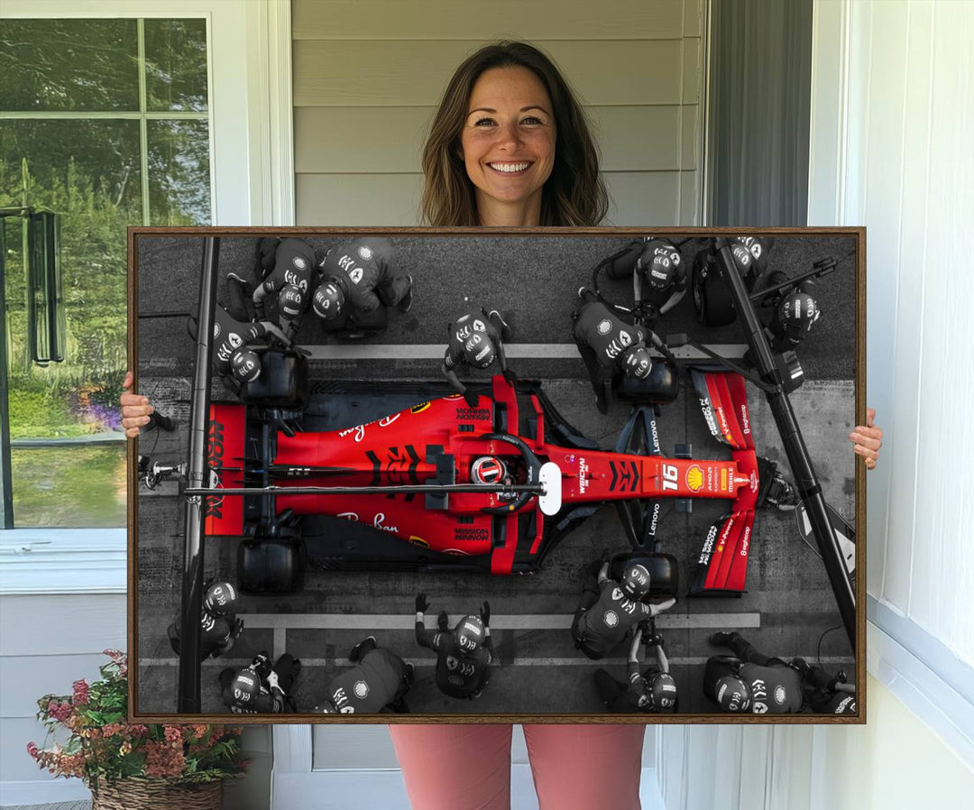 Ferrari Pit Stop Canvas Wall Art displayed prominently in the living room.