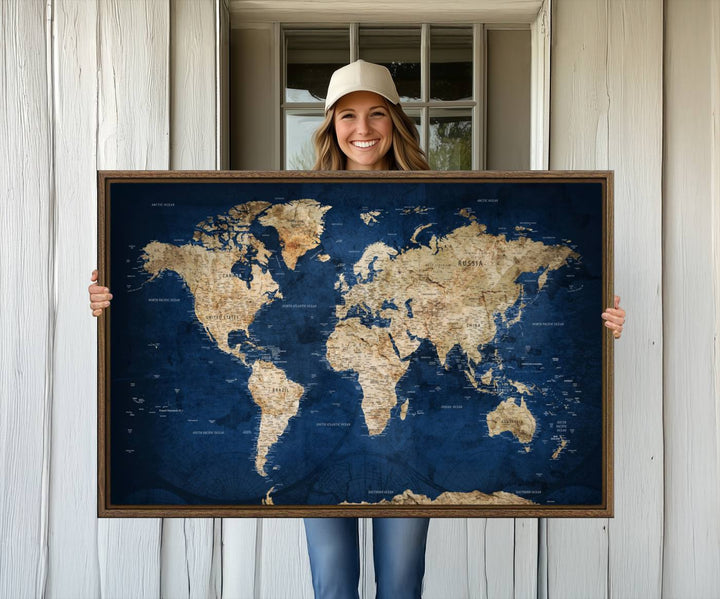 A personalized world map canvas print hangs above.