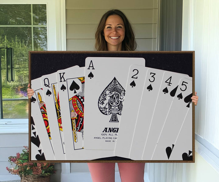 The oversized Poker Wall Art features the Ace of Spades and is displayed on a porch.