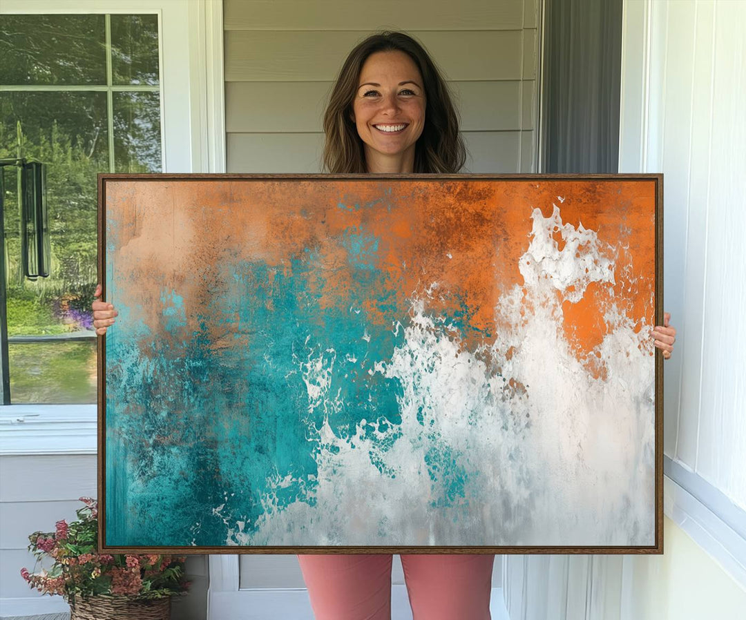The Vintage Abstract Print - Bold Teal and Orange Canvas Wall Art is displayed on a porch.