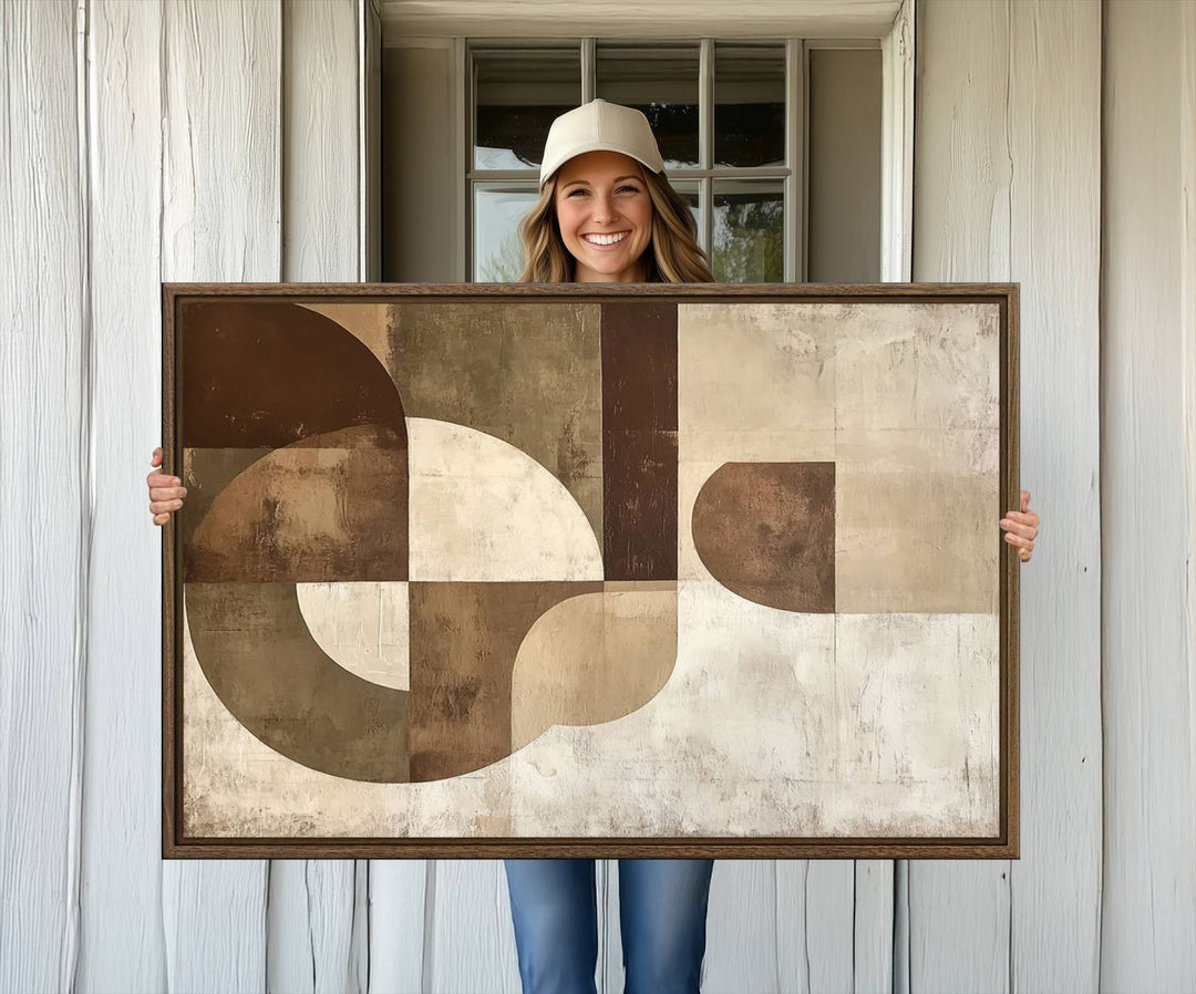 A Wabi Sabi Geometric Minimalist Wall Art Canvas Print—with a modern abstract geometric design in brown and beige tones—stands proudly in front of a house.