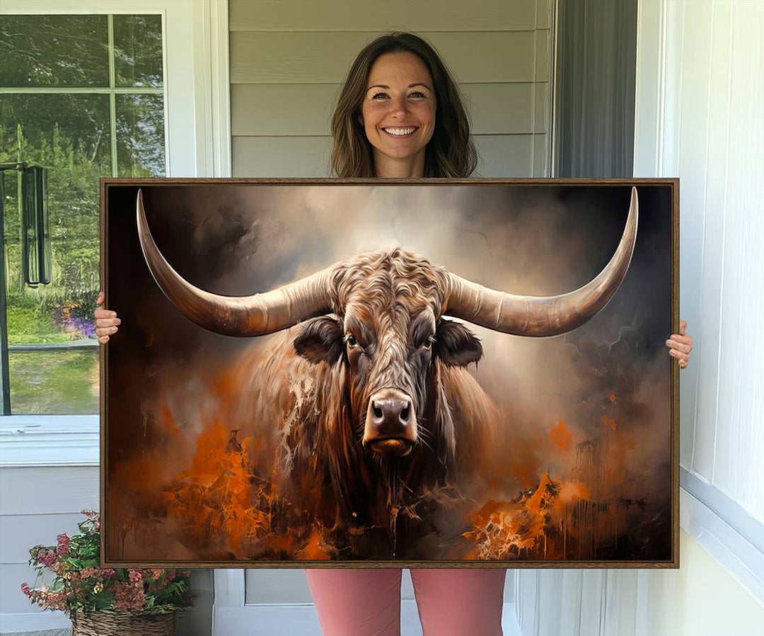 A Highland Bull with striking horns is depicted in a fiery abstract style on a ready-to-hang wall art canvas, evoking strength.