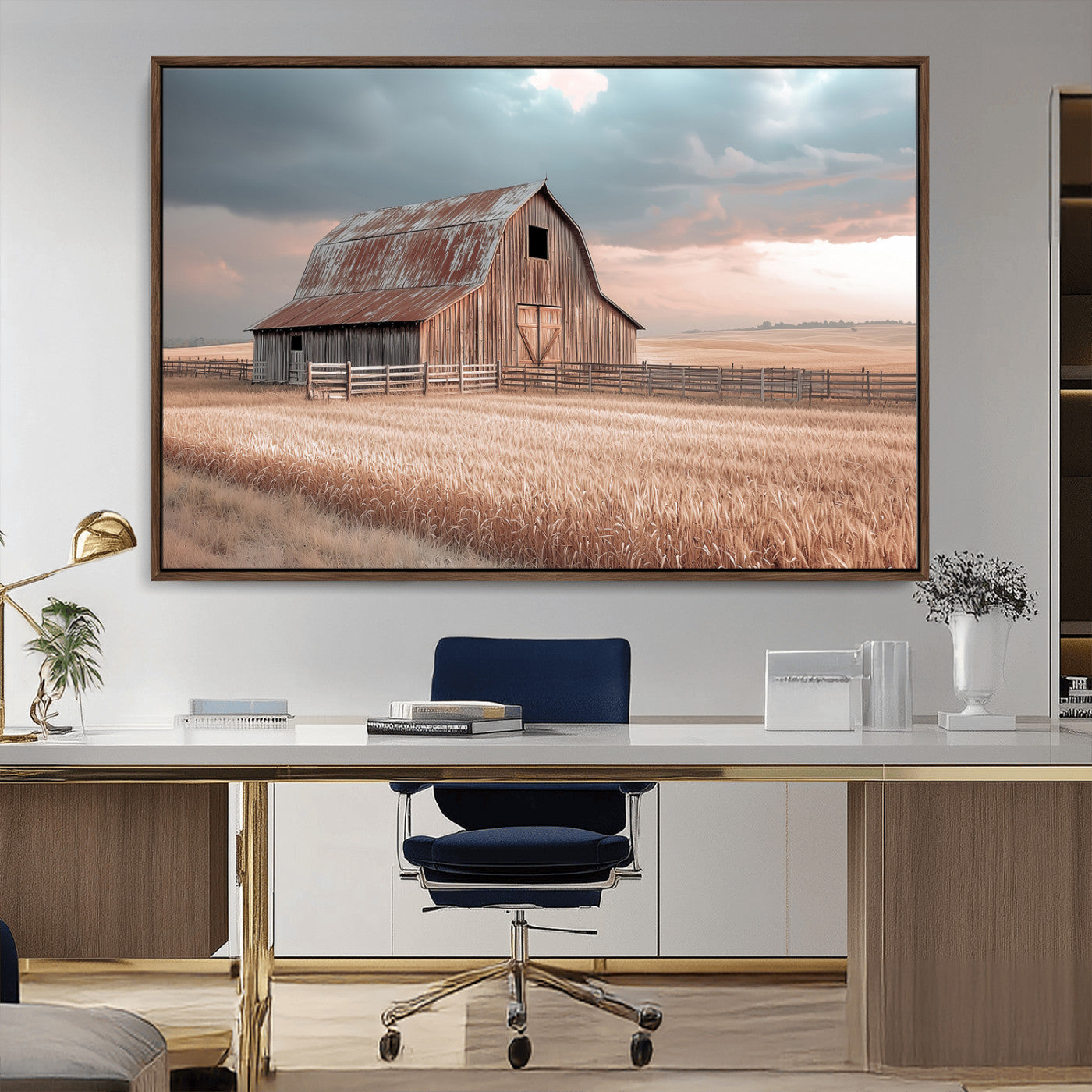 Framed canvas of a rustic barn in a golden wheat field under soft skies, ideal for vintage farmhouse or country-style wall decor.