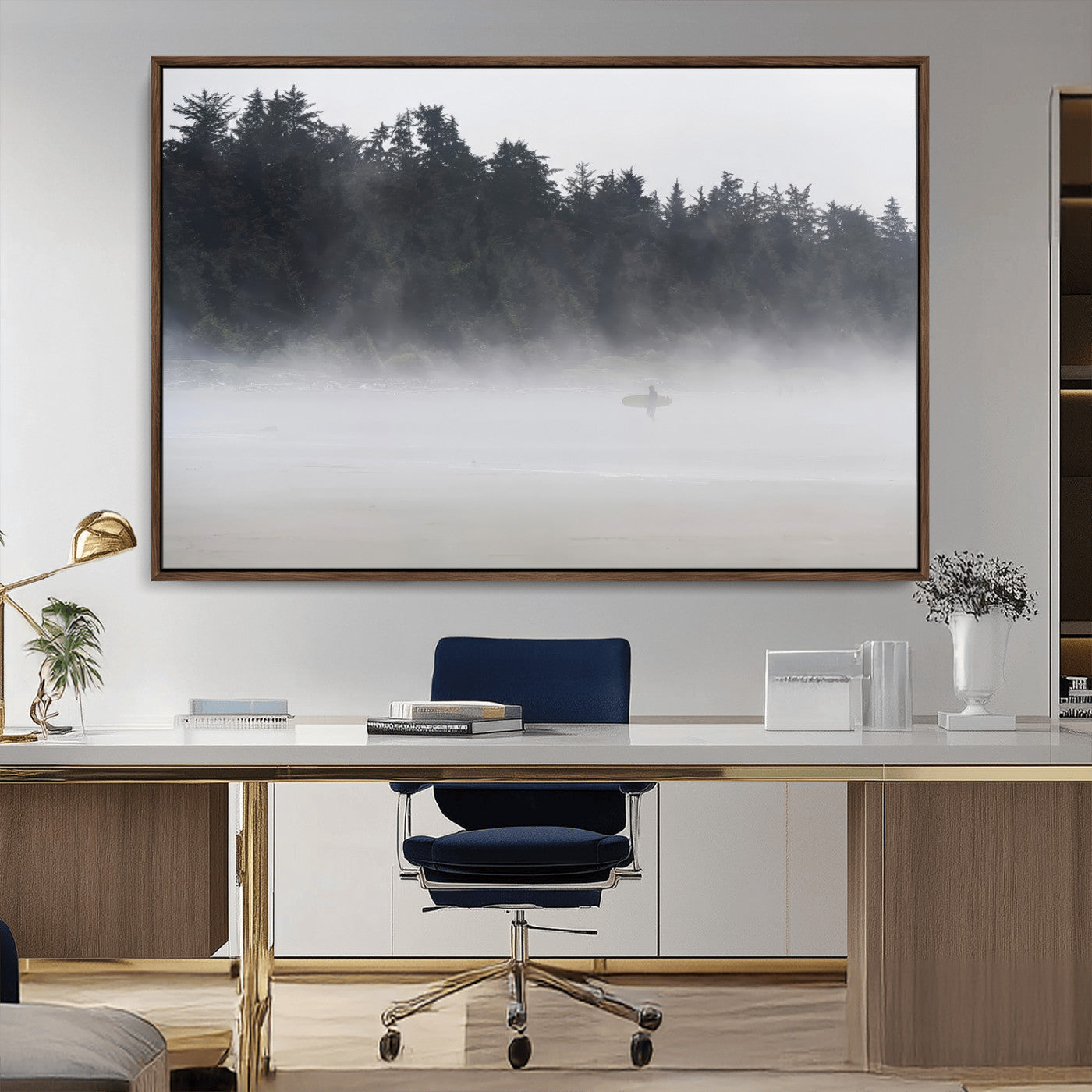 A lone surfer carrying a board through a misty shoreline, surrounded by dense trees and fog, creating a peaceful and mysterious coastal scene.