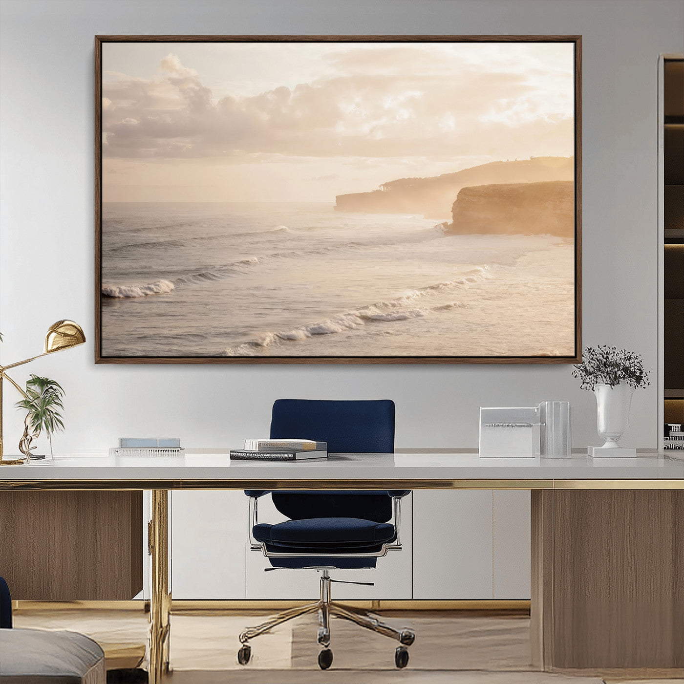 Golden hour seascape with misty cliffs and gentle waves rolling towards the shore, capturing a tranquil and warm coastal atmosphere.