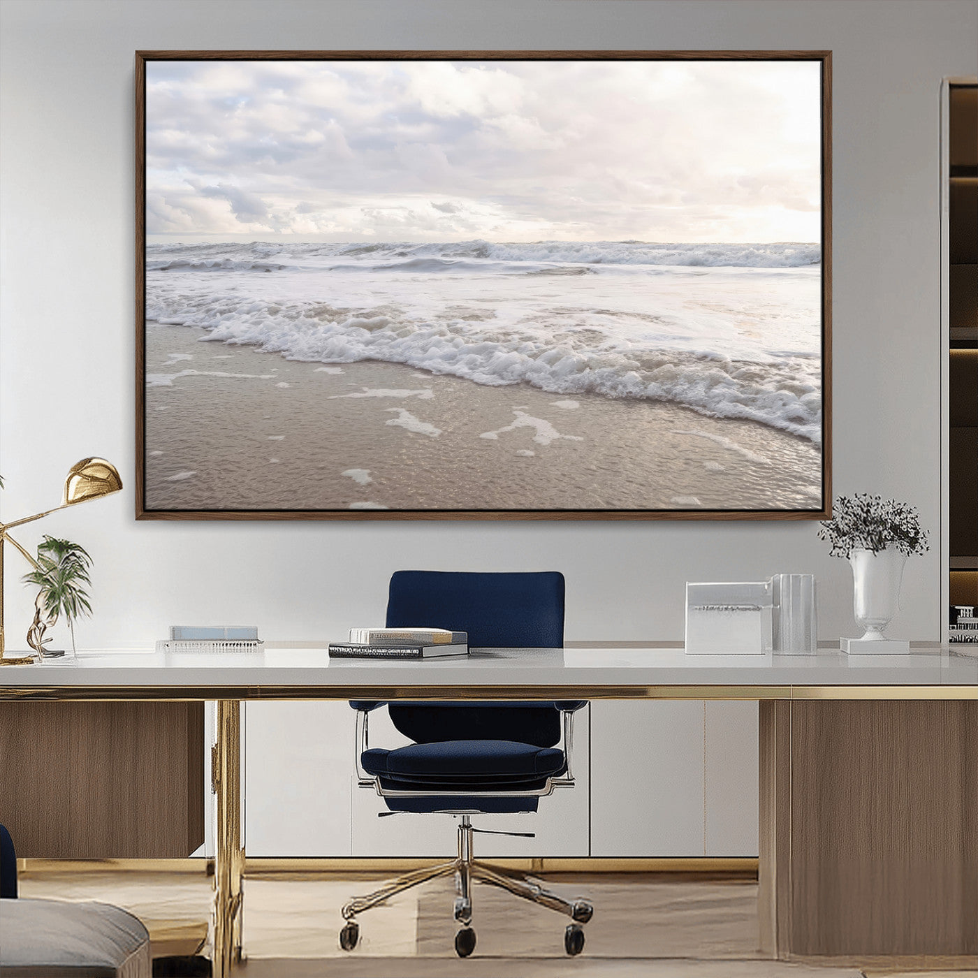 Peaceful ocean waves rolling onto the sandy shore under soft light, perfect for neutral or coastal minimalist decor themes.