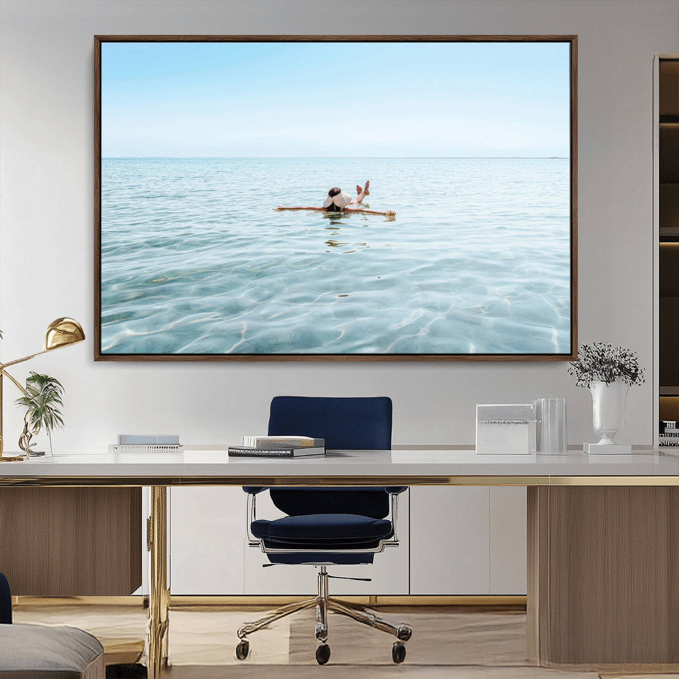 A peaceful minimalist scene of a person floating on crystal-clear water, surrounded by a vast open horizon, capturing relaxation and serenity in a tranquil aquatic setting.