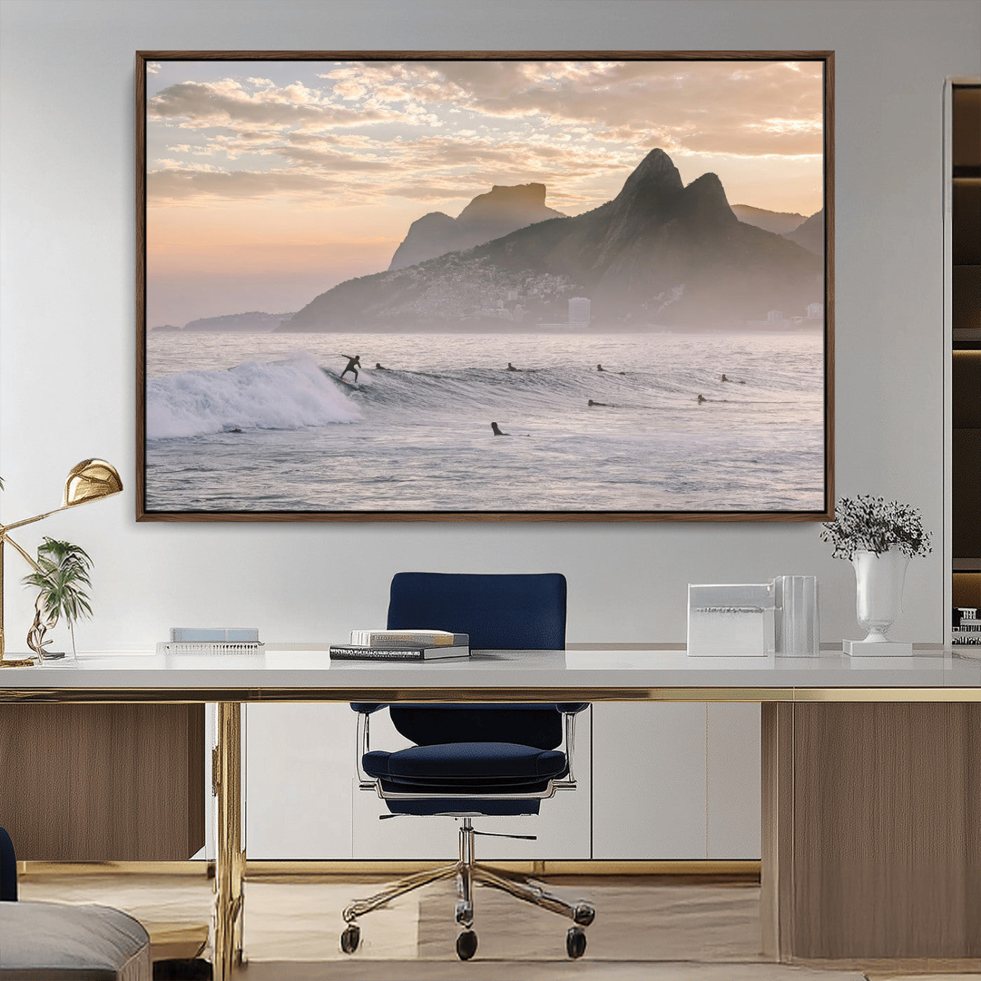 A surfer rides a golden hour wave near misty coastal mountains, surrounded by fellow surfers, capturing the spirit of a coastal adventure.