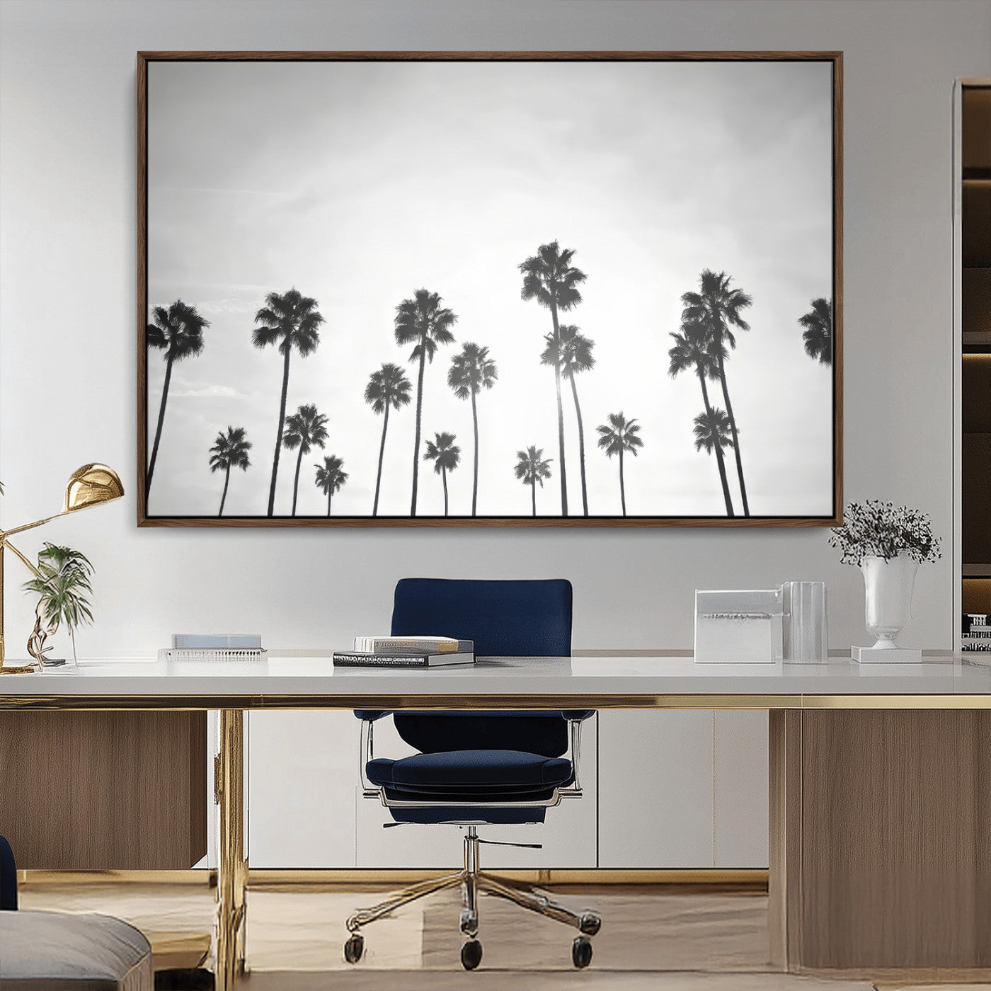 A black and white minimalist scene featuring tall palm trees silhouetted against a bright sky, creating a dreamy and timeless tropical aesthetic.