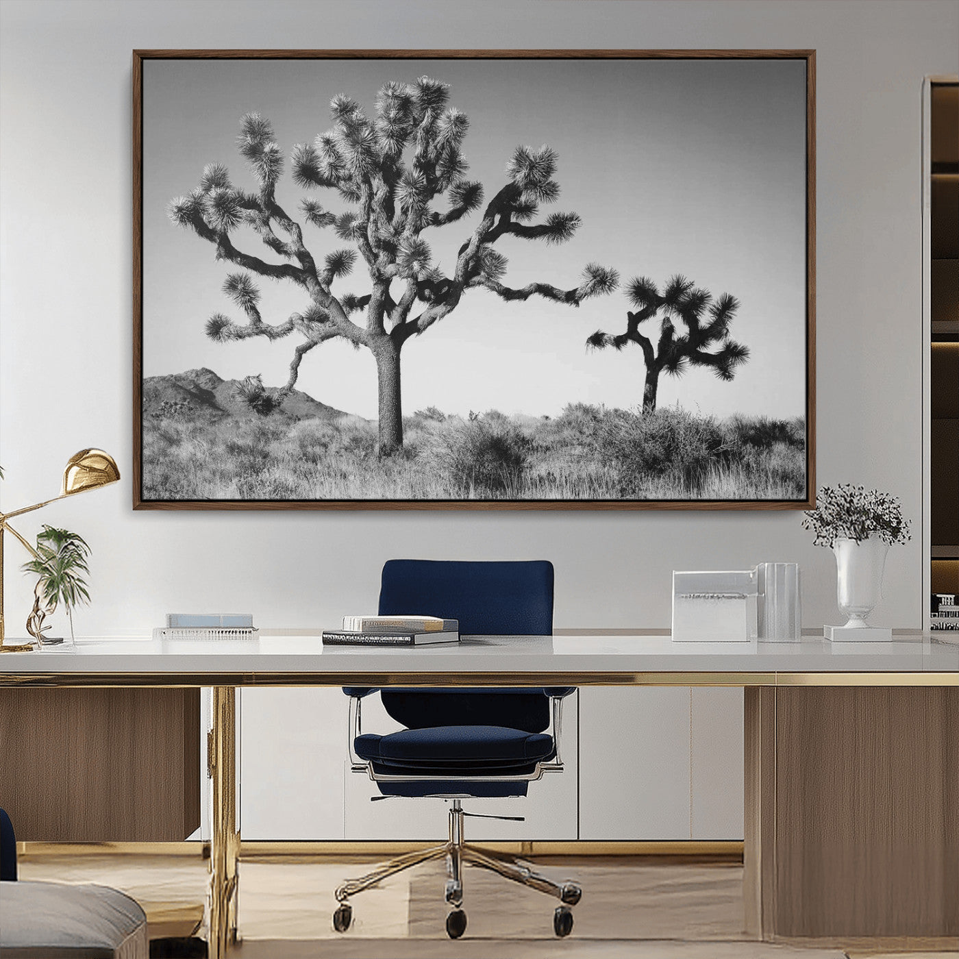 Black and white desert scene with two Joshua trees under clear sky, perfect for rustic or boho-inspired home decor.