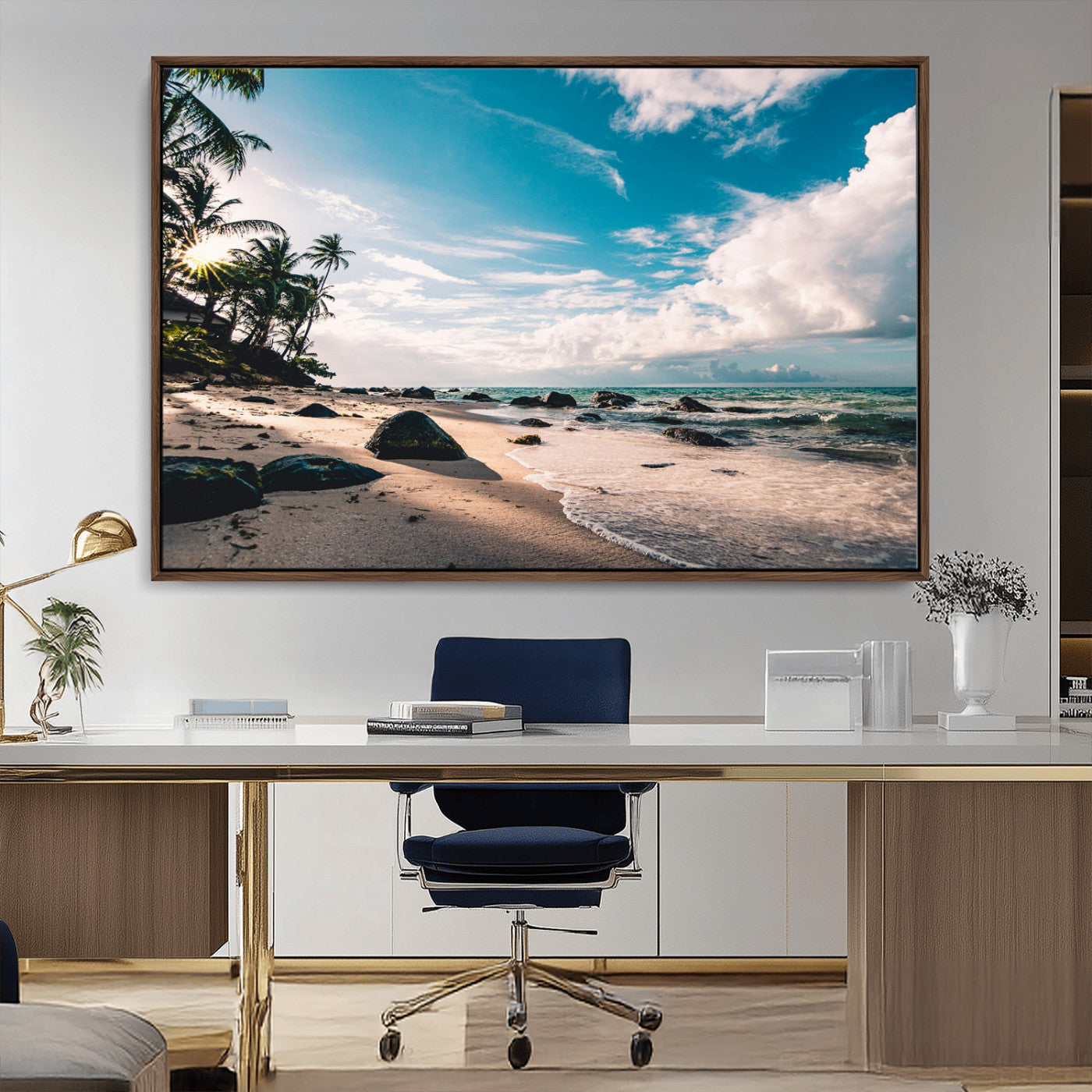 Scenic tropical beach with palm trees, ocean waves, and rocky shoreline under a bright blue sky, creating a serene coastal vibe.