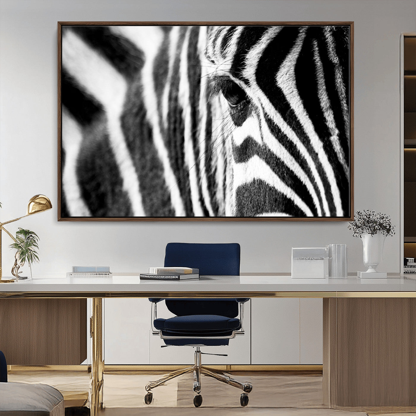 A close-up black and white photograph of a zebra's eye, showcasing the intricate patterns of its stripes in sharp detail.