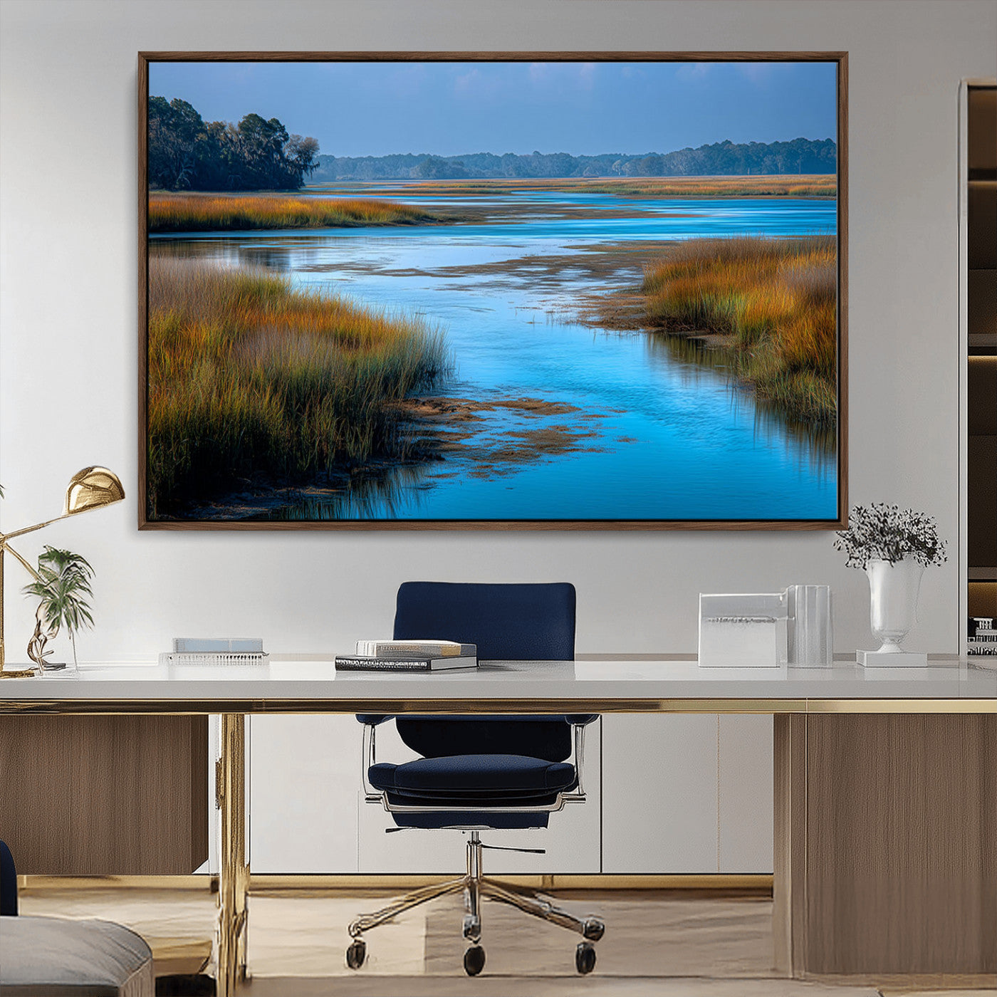 A peaceful marshland scene with calm blue water reflecting the surrounding grasses and trees, capturing the beauty of nature in a serene landscape.