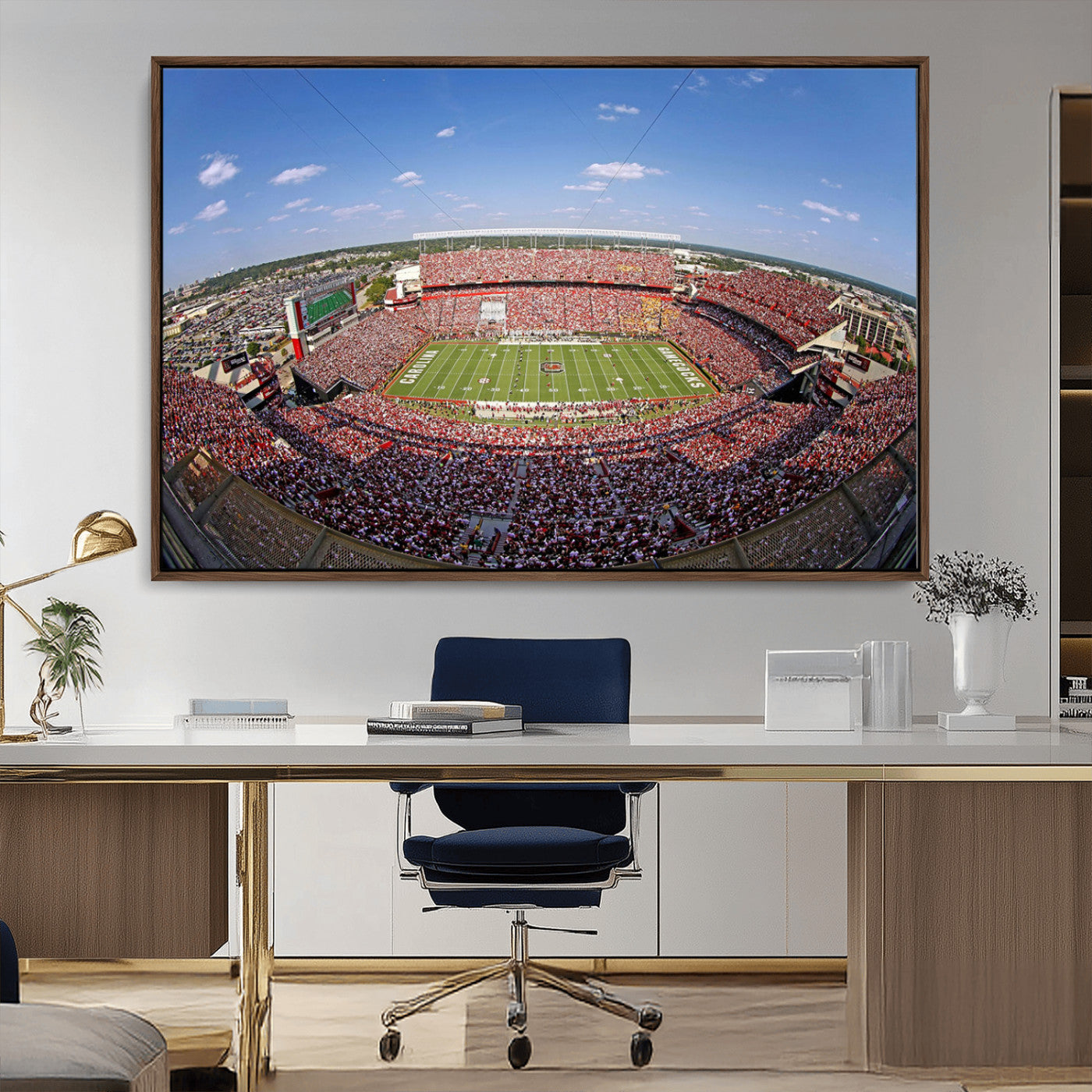 An William Brice-Stadium view of a full football stadium with cheering fans and clear blue skies, capturing the excitement and energy of the game.