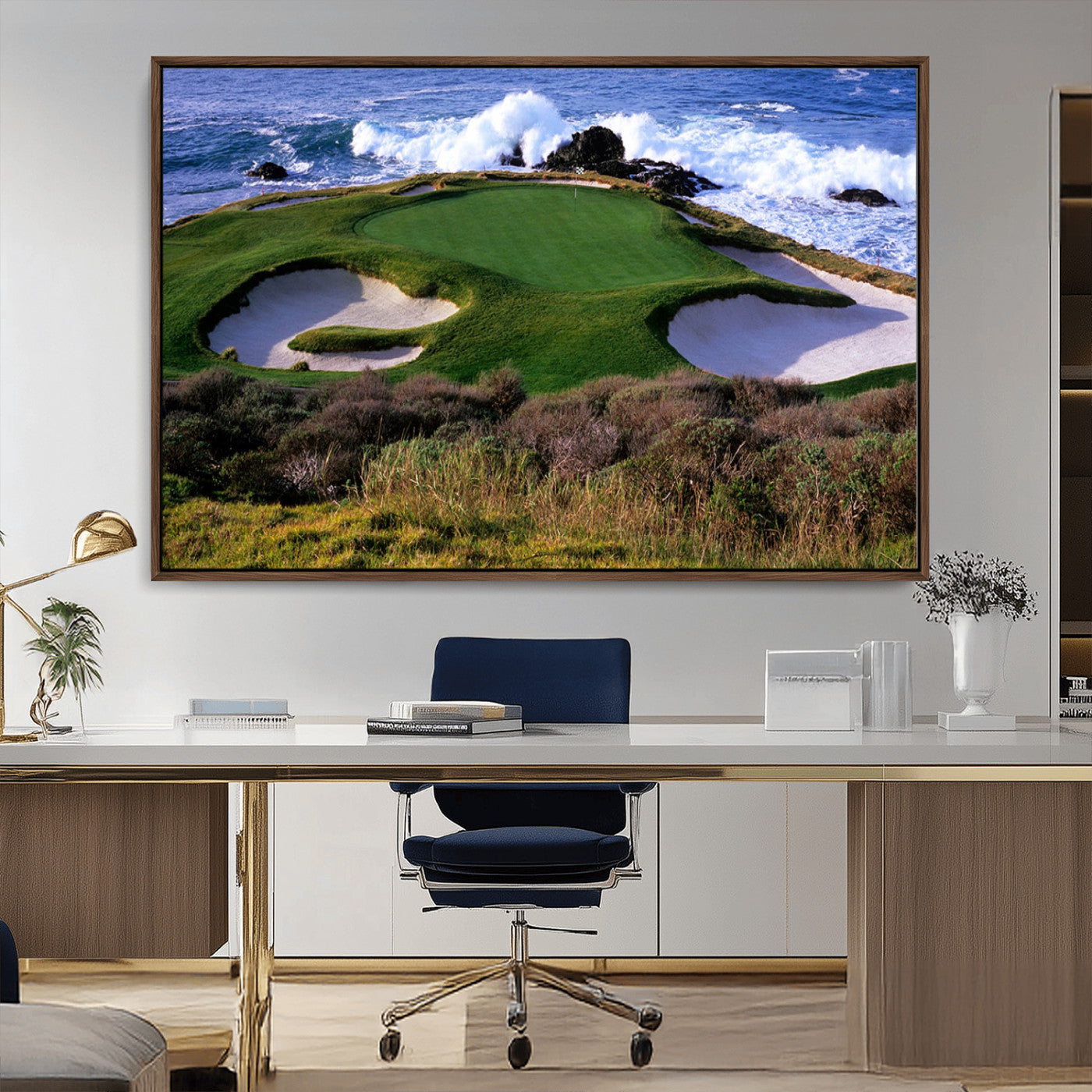 A scenic golf course located by the ocean, featuring a well-manicured green surrounded by sand traps and powerful ocean waves crashing on the shore.