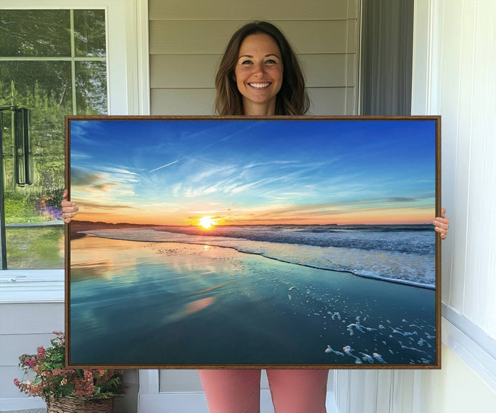 The Blue Sky and Beach Wall Art Canvas Print features a vibrant orange sky reflecting on wet sand.