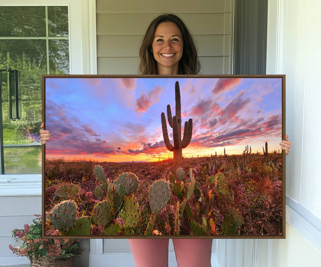 The Arizona Desert Sunset Wall Art Canvas Print featuring cacti is displayed.