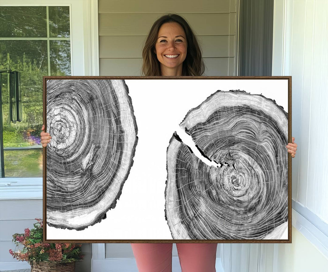 The modern black and white tree rings canvas art adds minimalist geometric decor with nature inspiration.