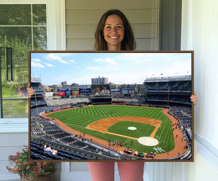 The living room features a Buffalo Bills Stadium wall art.