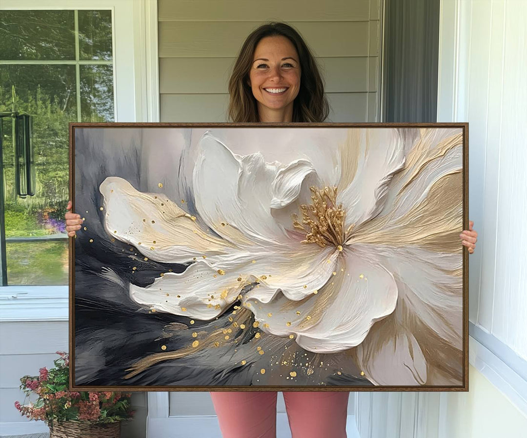 Elegant White and Gold Floral Triptych Canvas Art, a modern textured flower painting for home or office decor, features a blurred gray background.