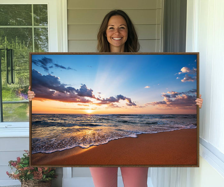 A Golden Hour Beach Sunset canvas hangs in the living room.