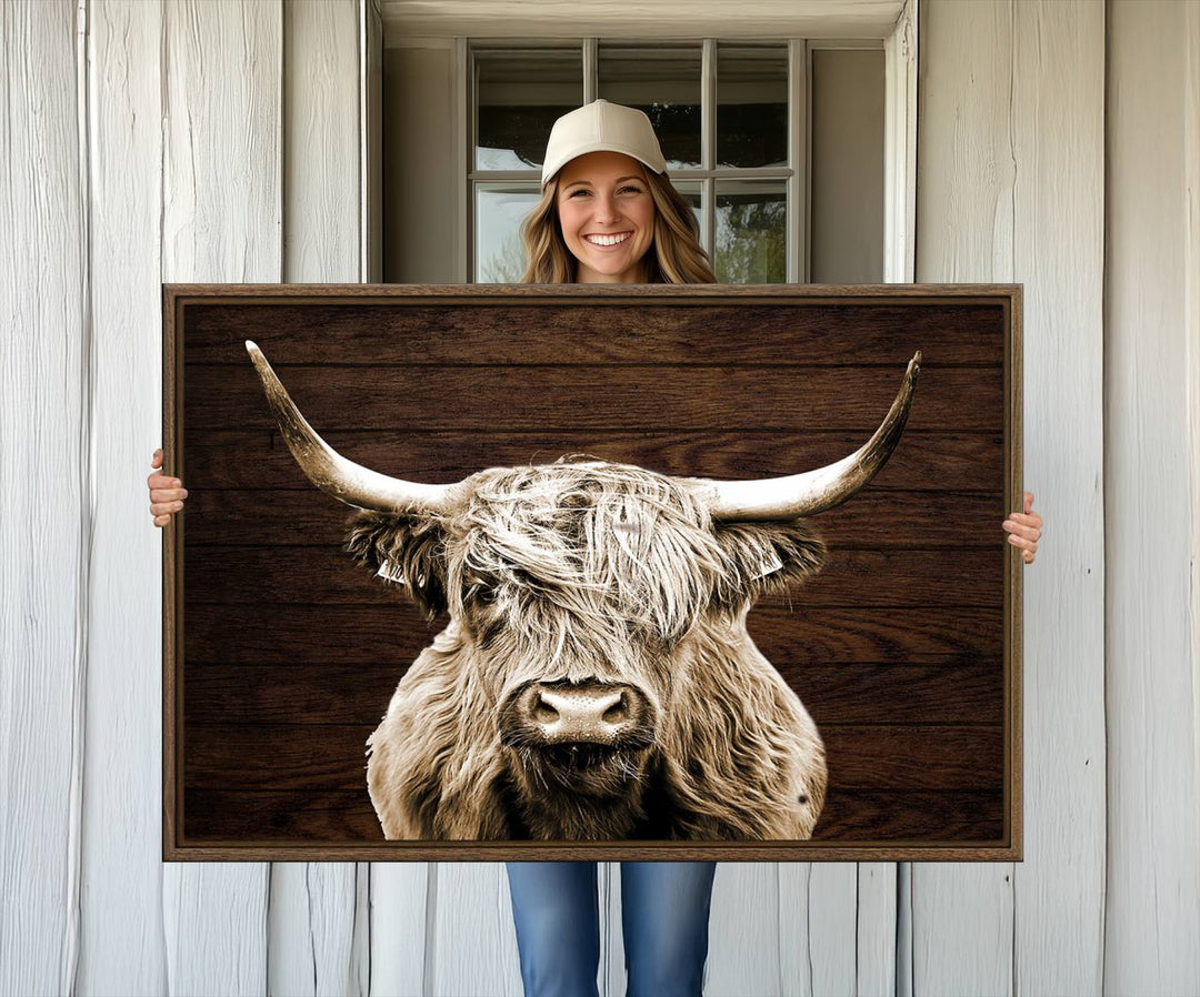 Highland Cow Wall Art Canvas Print: Majestic Scottish bull on rustic decor, ready to hang.