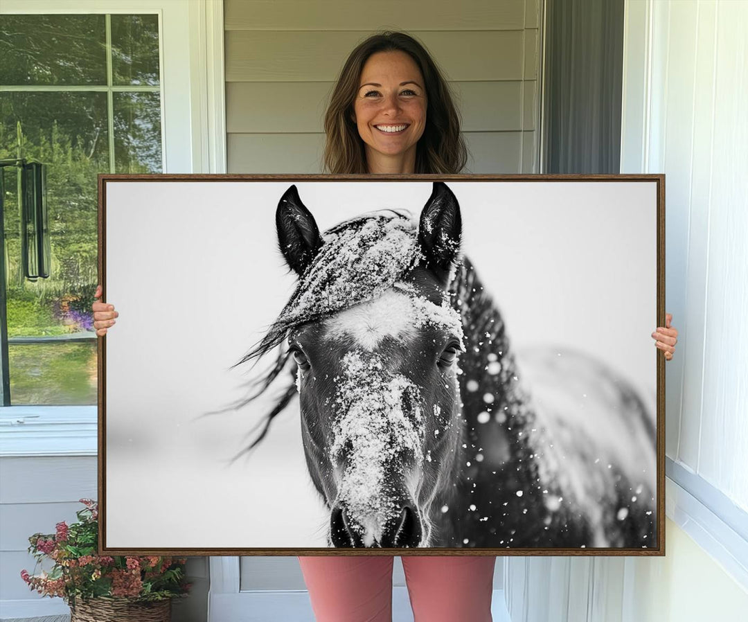 This black and white winter horse wall art enhances any decor; it is ready to hang and framed for a farmhouse or Western style.