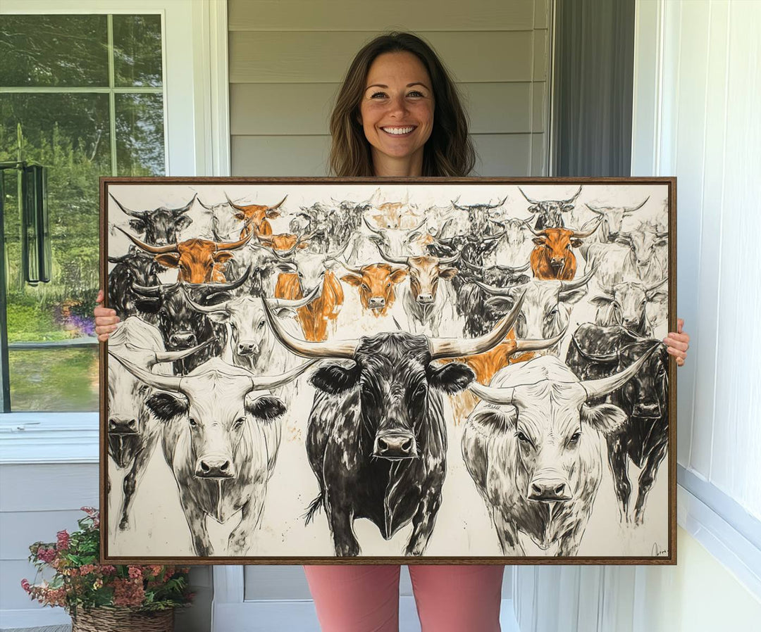 The Texas Longhorn Herd Canvas Print hangs on a white wall.