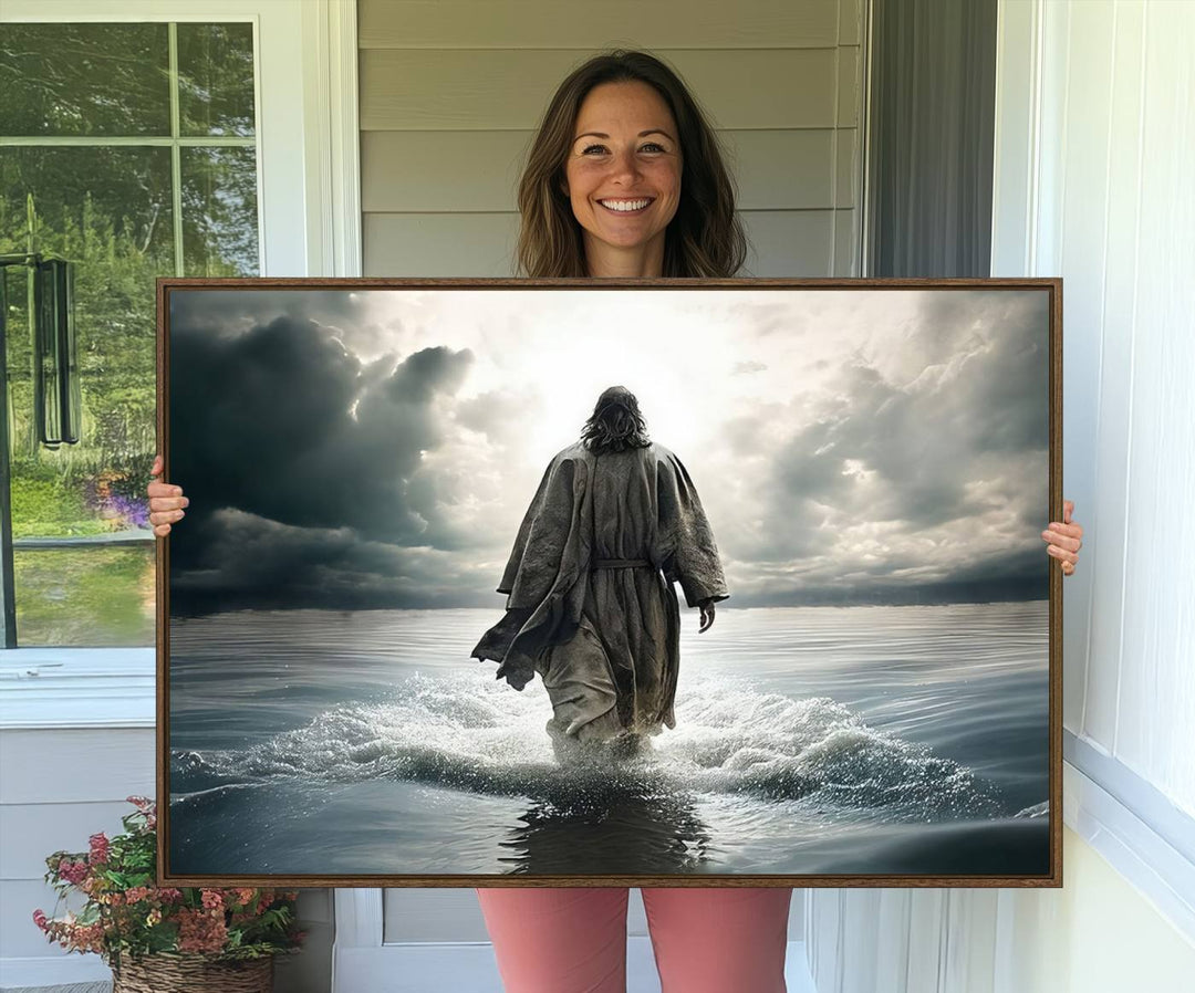 A canvas wall art depicting a figure walking on water beneath dramatic clouds, designed as inspirational religious imagery and ready to hang.