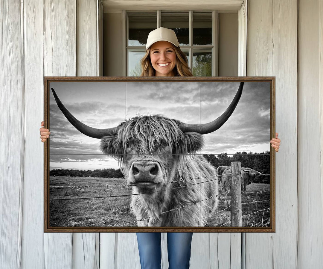 The Scottish Highland Cow Wall Art Canvas Print is ready to hang and framed, adding rustic farmhouse decor to your wall.