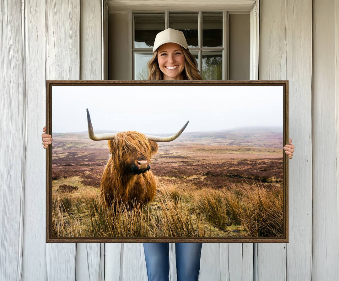 The Scottish Highland Cow Wall Art is perfect for rustic farmhouse decor, featuring misty moorland hues.