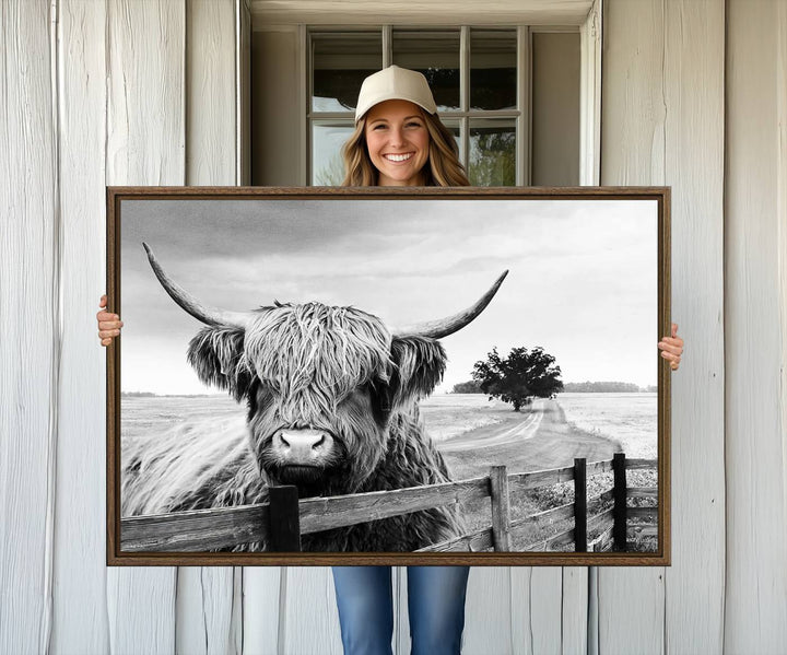 The Scottish Highland Cow Wall Art, a black and white canvas print, enhances rustic farmhouse décor.