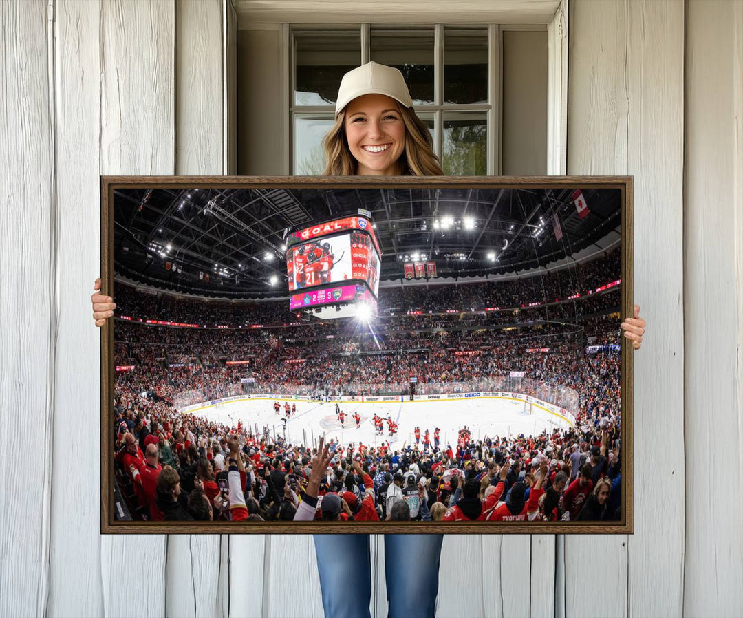 The wall art, a high-quality basketball arena canvas, evokes the excitement of fans cheering at the Amerant Bank Arena.