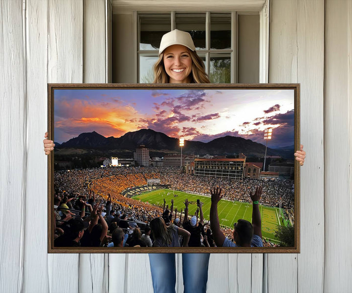 The Folsom Field Stadium Print beautifully captures the Colorado Buffaloes stadium at sunset, set against a stunning mountain backdrop.