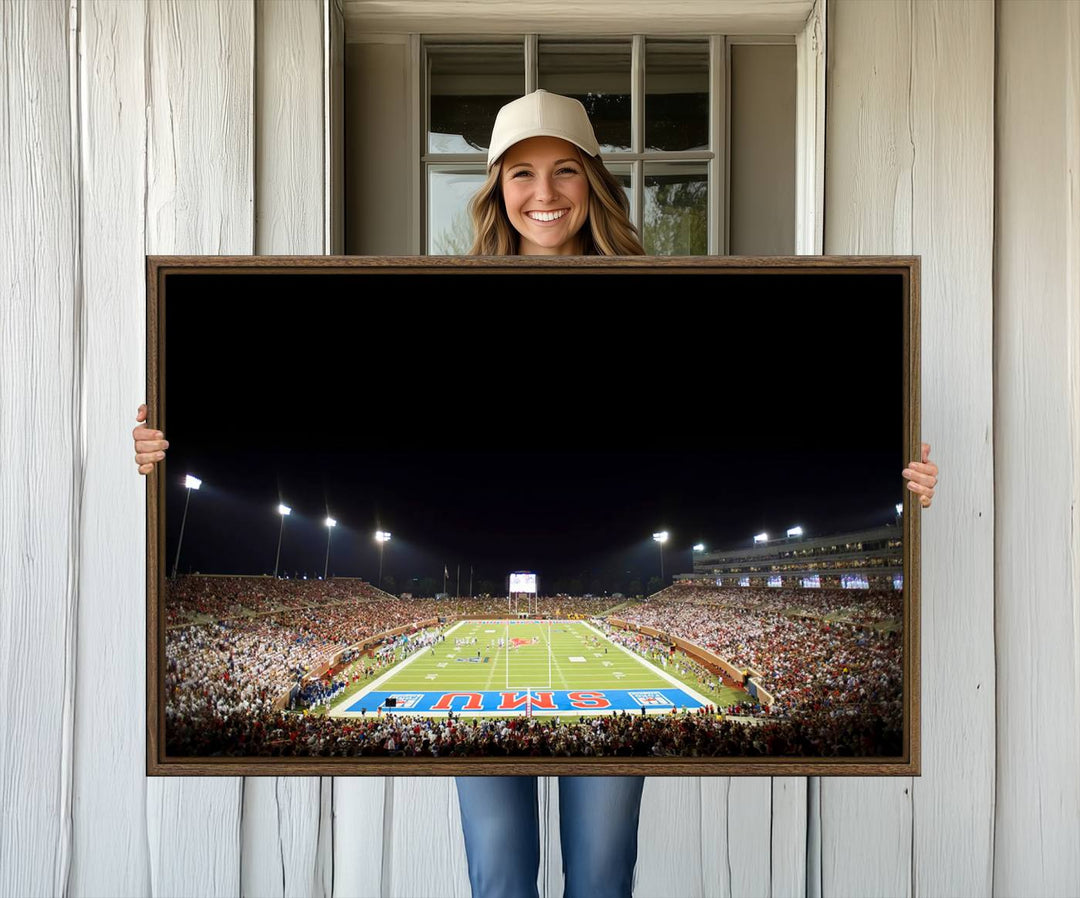 Wide-angle view of a vibrant painting depicting SMU Mustangs Football at Dallas Gerald J. Ford Stadium, capturing the energy and excitement of a filled stadium and brightly lit field.