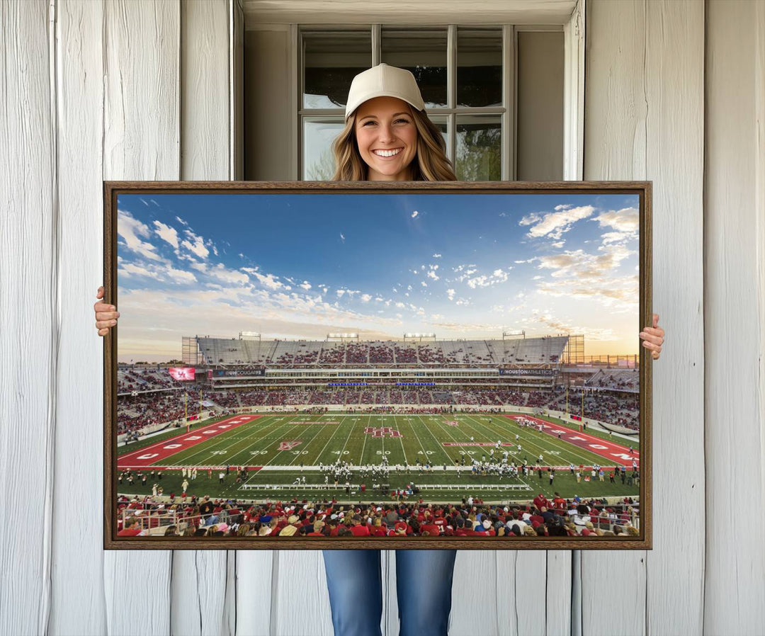 A Houston Cougars print of TDECU Stadium with a game crowd beautifully enhances the living room decor.