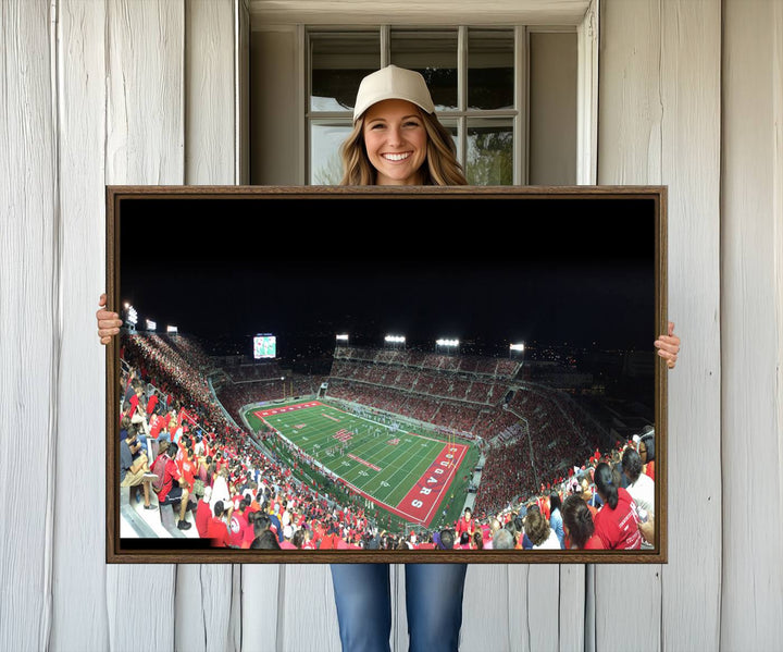 The wall art canvas print features a scene from a packed TDECU Stadium at night, highlighting the field and scoreboard.