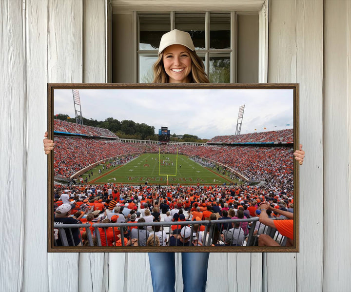 The Virginia Cavaliers Wall Art Canvas Print features a thrilling game at Scott Stadium surrounded by greenery.