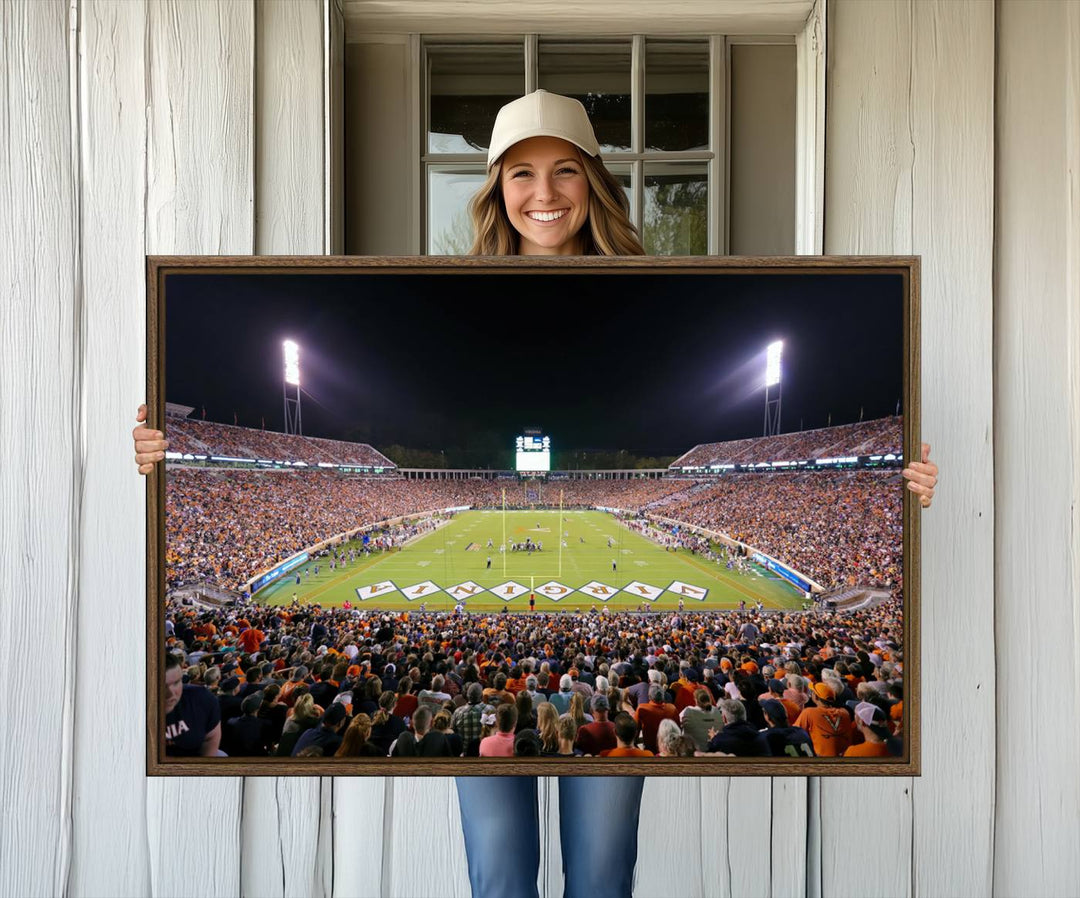 A Virginia Cavaliers Wall Art Canvas Print captures Scott Stadium filled with fans under the night sky.