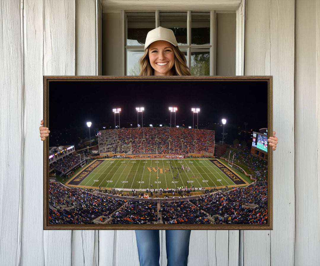 The Demon Deacons stadium print captures a brightly lit, bustling scene on museum-quality canvas.