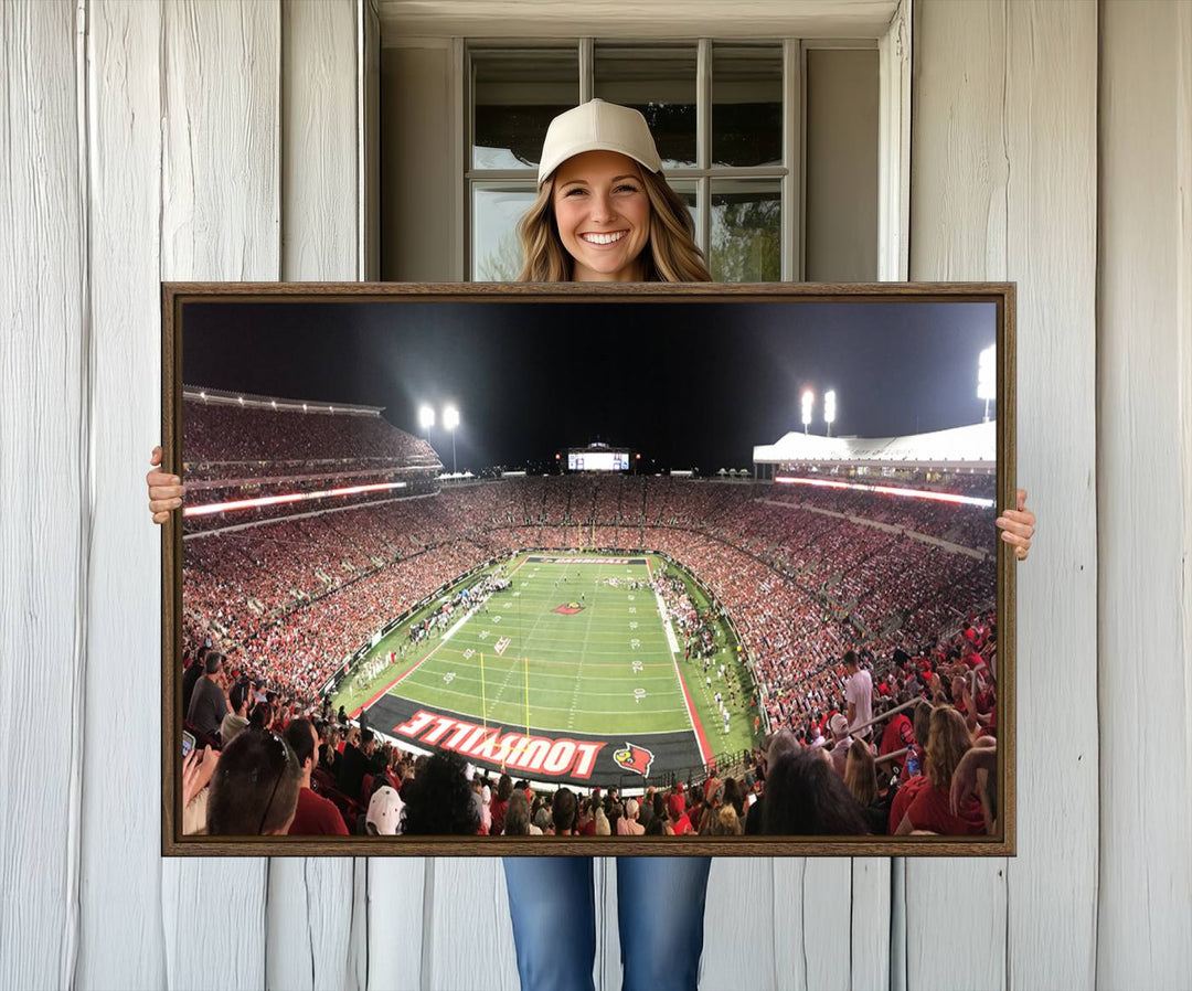 Panoramic view of a crowded football stadium with Louisville in the end zone, crafted as University of Louisville wall art.