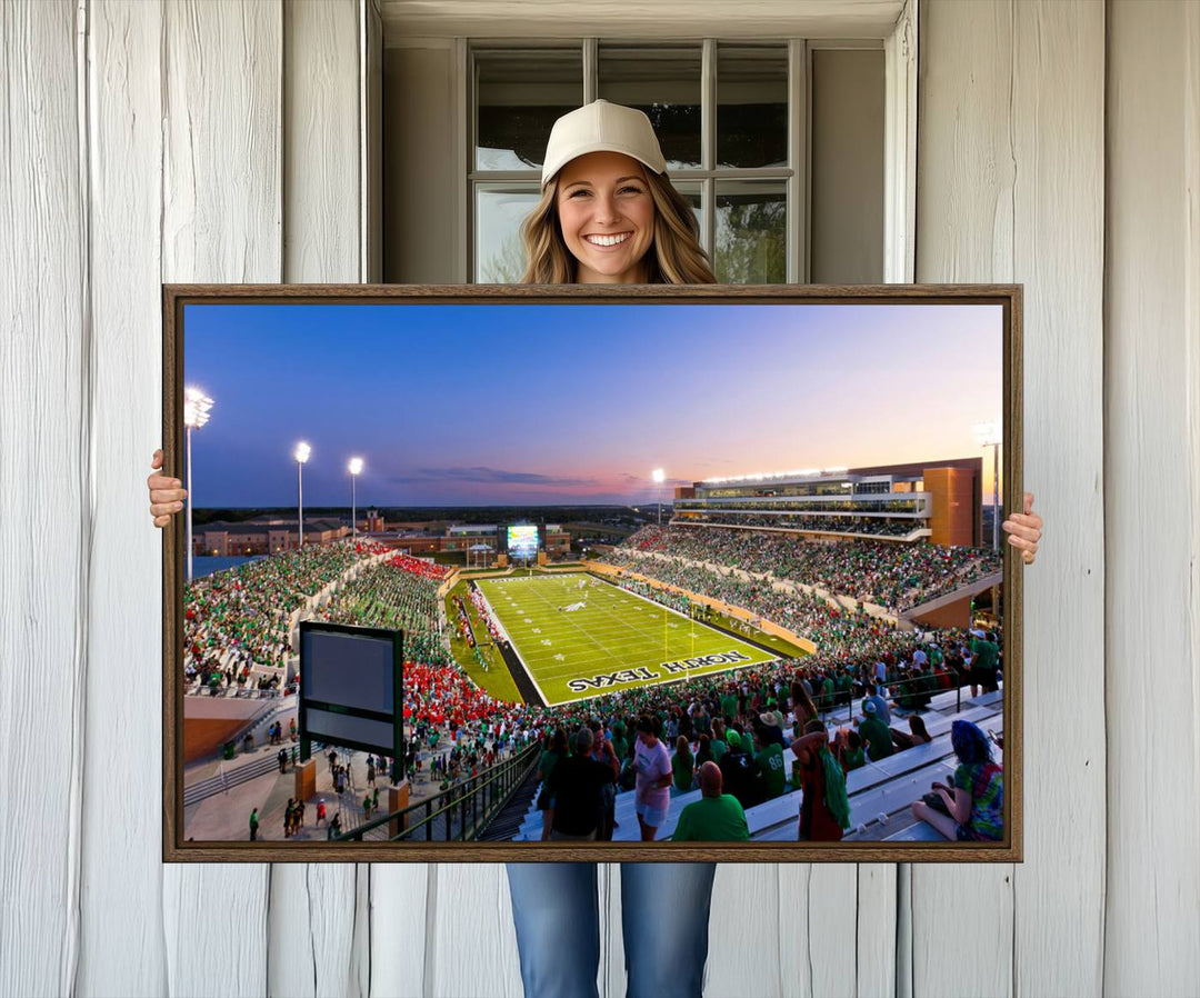 Aerial view of University of North Texas DATCU Stadium at sunset on canvas, showcasing a colorful sky.