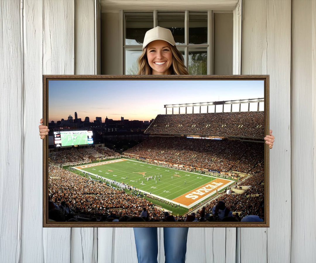 The Evening Game canvas art captures a glowing sunset and skyline at Texas Longhorns Darrell K Royal Stadium.