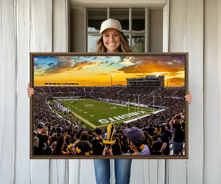 A sunset football game at UCFs Stadium—ideal as a premium wall art canvas print for your home.