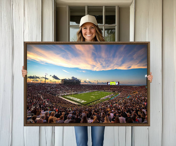 A vibrant wall art canvas captures a sunset scene at Orlandos FBC Mortgage Stadium, featuring the UCF Knights.